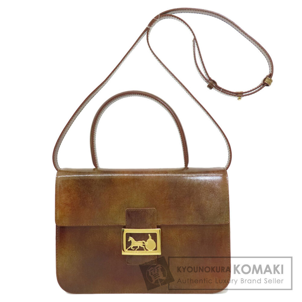 Celine shoulder bag featuring iconic horse carriage buckle Brown
